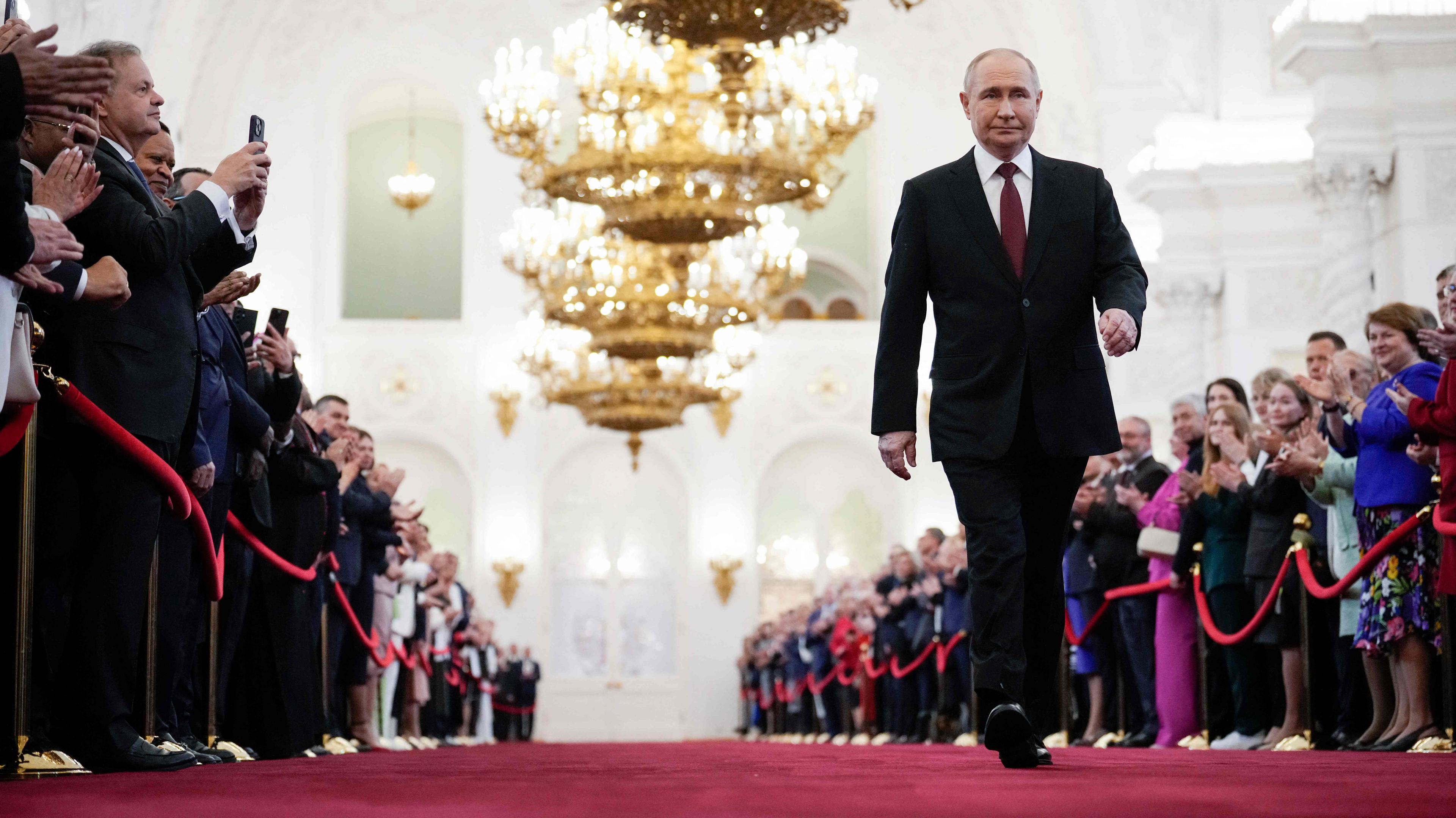 Russian president-elect Vladimir Putin walks prior to his inauguration ceremony at the Kremlin in Moscow on May 7, 2024. (Photo by Alexander Zemlianichenko / POOL / AFP)
