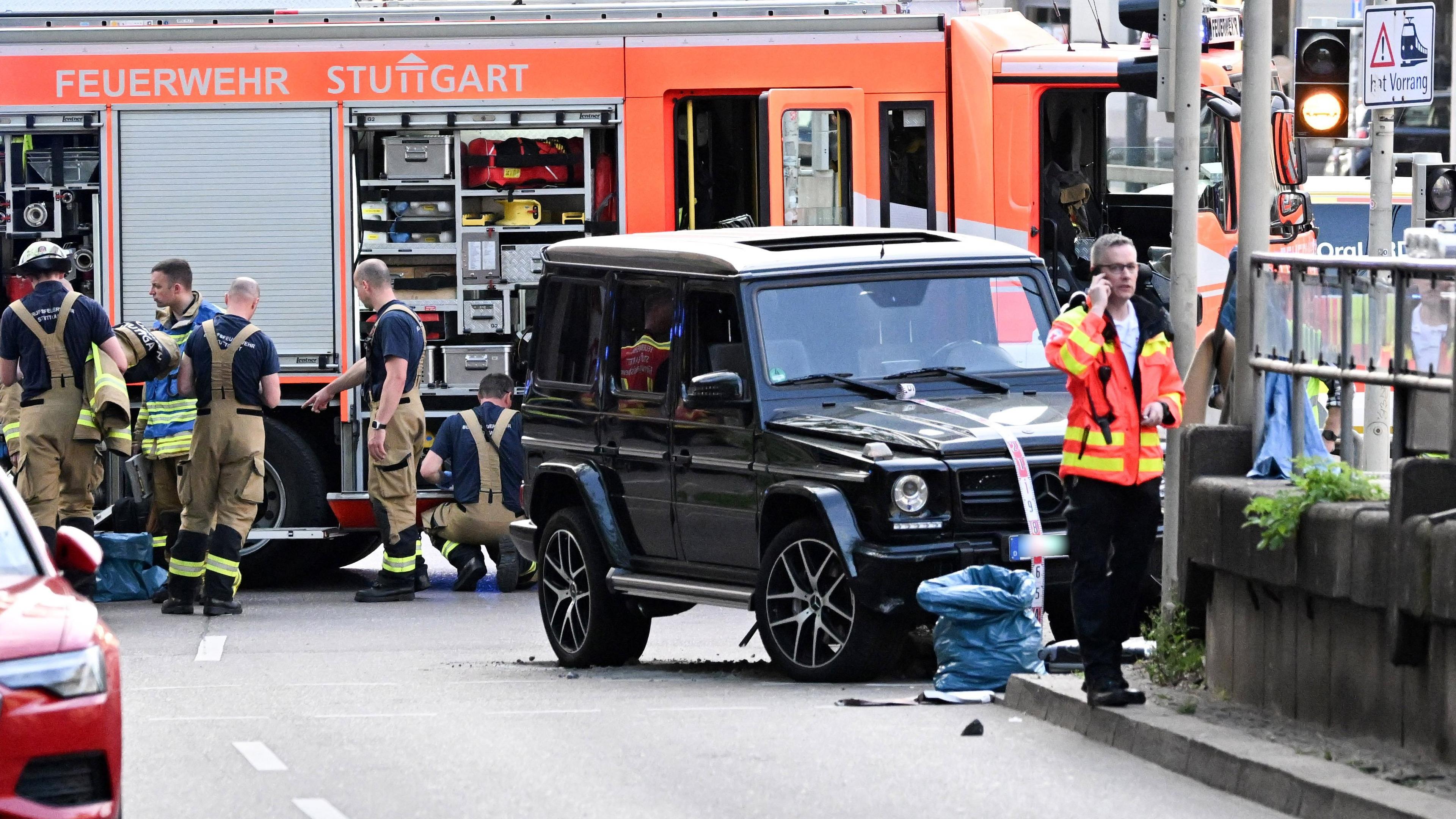 Car drives in a group of people in Stuttgart