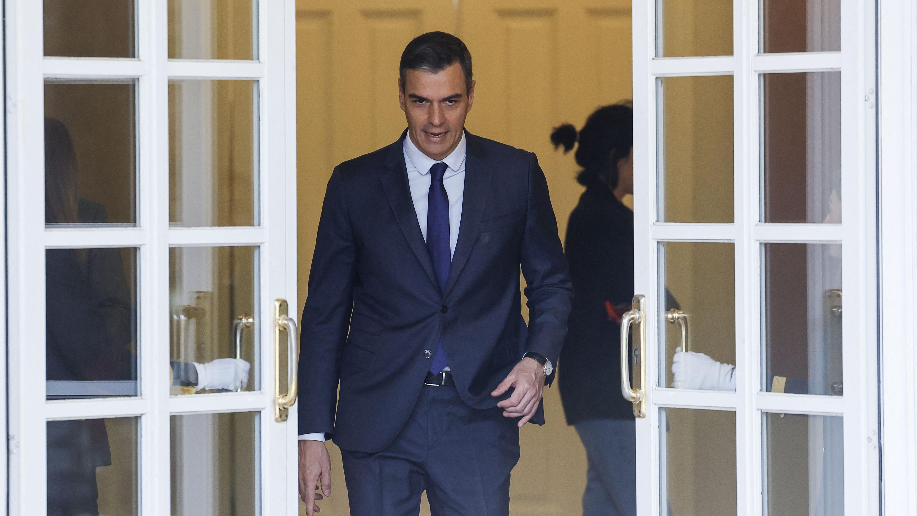 (FILES) Spain's Prime Minister Pedro Sanchez arrives to welcome the President of Cape Verde ahead of their meeting at La Moncloa palace in Madrid, on April 5, 2024. Spain PM says to stay on despite political harassment, AFP reports on April 29, 2024. (Photo by OSCAR DEL POZO / AFP)