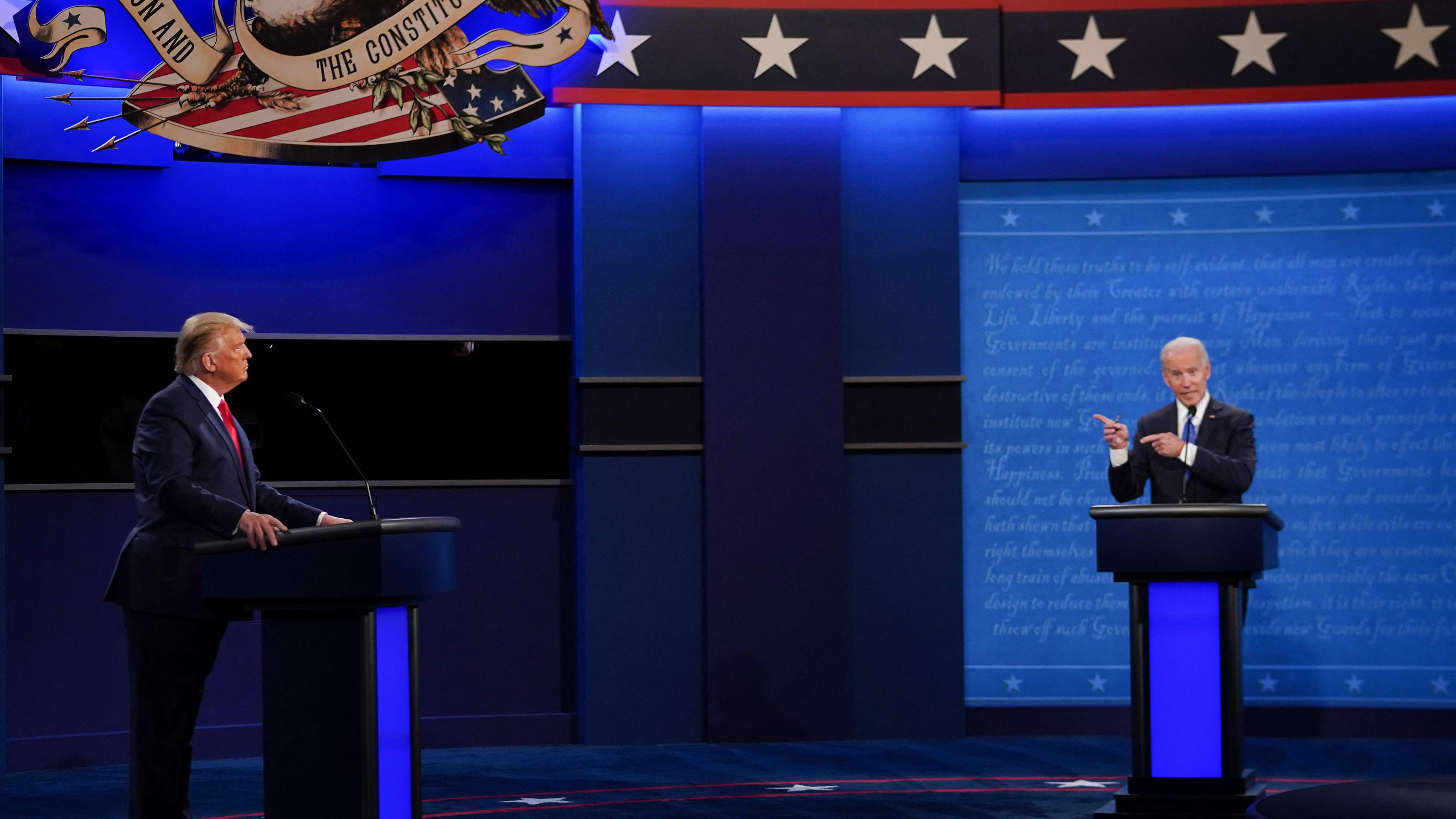 (FILES) US President Donald Trump (L) and Democratic Presidential candidate and former US Vice President Joe Biden (R) participate in the final presidential debate at Belmont University in Nashville, Tennessee, on October 22, 2020. US President Joe Biden and former US President Donald Trump agreed on May 15, 2024, to hold presidential debates in June and September after the Democratic incumbent challenged his rival to "make my day" and the scandal-plagued Republican replied he was ready to "rumble." (Photo by Brendan Smialowski / AFP)