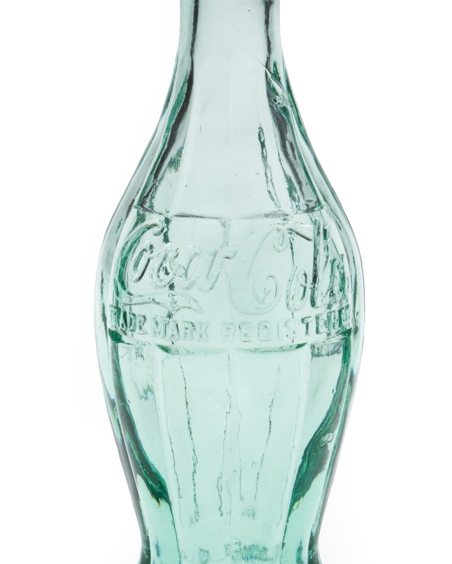 Die Coca-Cola Flasche wird 100