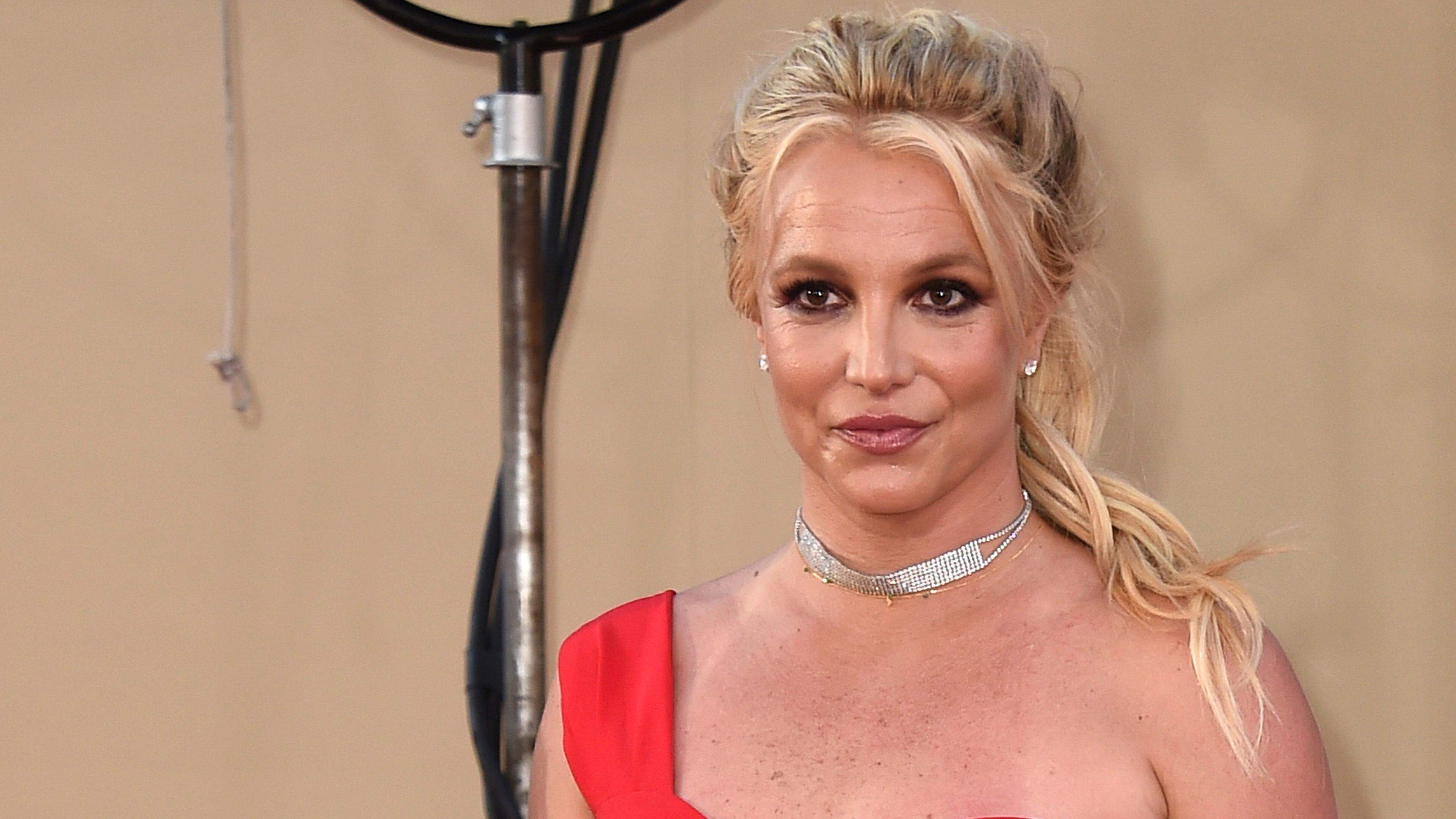 ARCHIV - 23.07.2019, USA, Los Angeles: Sänger Britney Spears kommt zur Premiere von "Once Upon a Time in Hollywood". (zu dpa: «Britney Spears weist Berichte über angeblichen Streit in Hotel zurück») Foto: Jordan Strauss/Invision via AP/dpa +++ dpa-Bildfunk +++