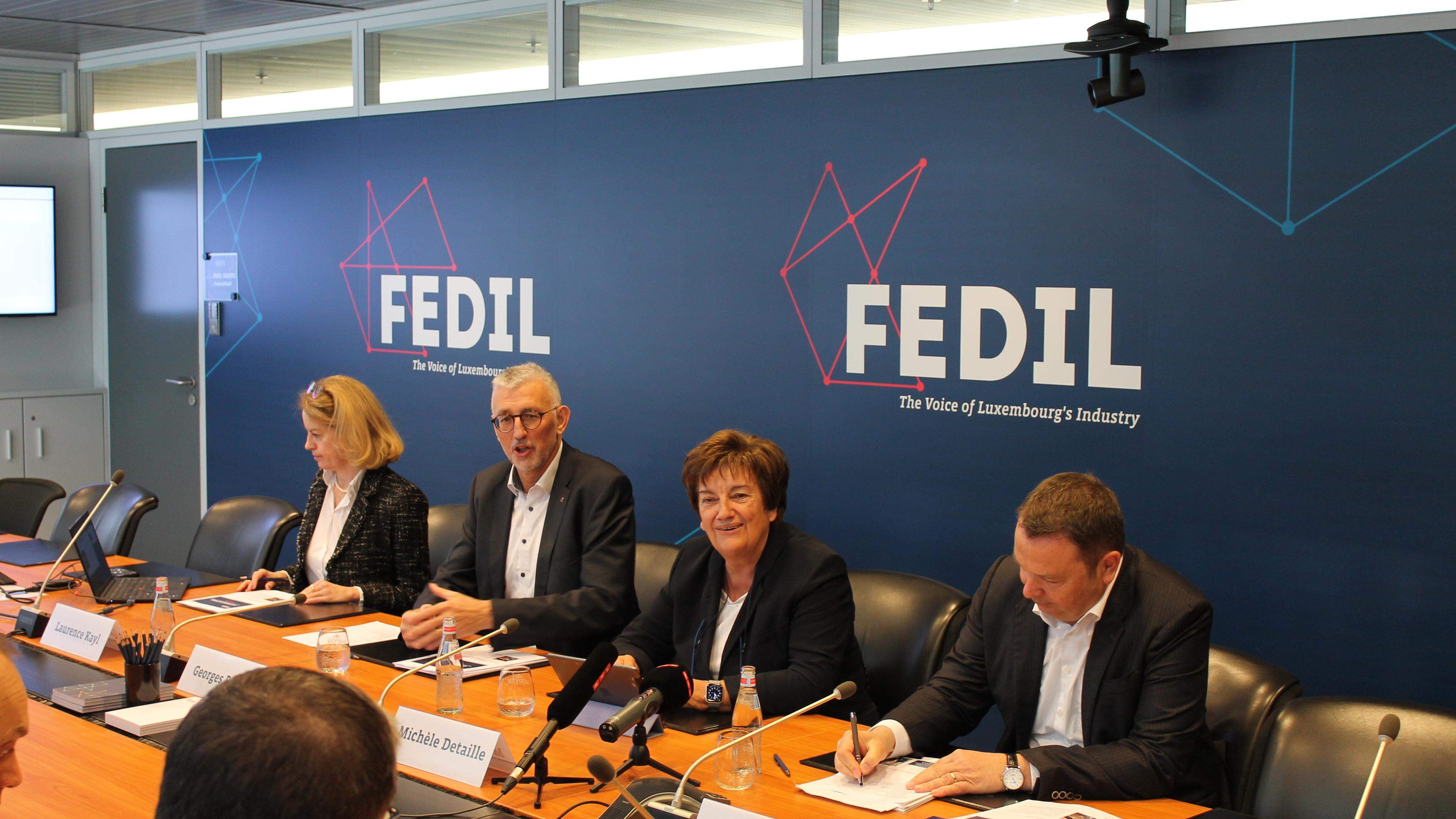 Michèle Detaille (2nd from right) has now been succeeded by Georges Rassel (2nd from left) as Fedil president, flanked by head of communications Laurence Kayl and Fedil director René Winkin